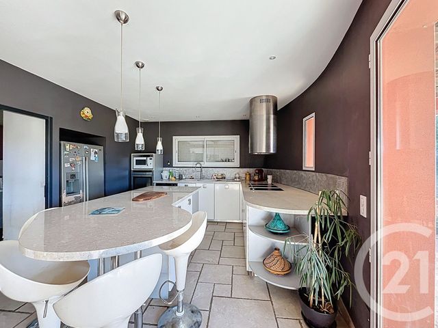 Afficher la photo en grand maison à vendre - 6 pièces - 155.42 m2 - POUSSAN - 34 - LANGUEDOC-ROUSSILLON - Century 21 Bassin De Thau