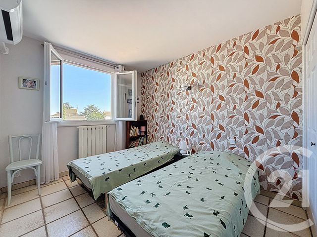 Afficher la photo en grand maison à vendre - 5 pièces - 135.3 m2 - POUSSAN - 34 - LANGUEDOC-ROUSSILLON - Century 21 Bassin De Thau